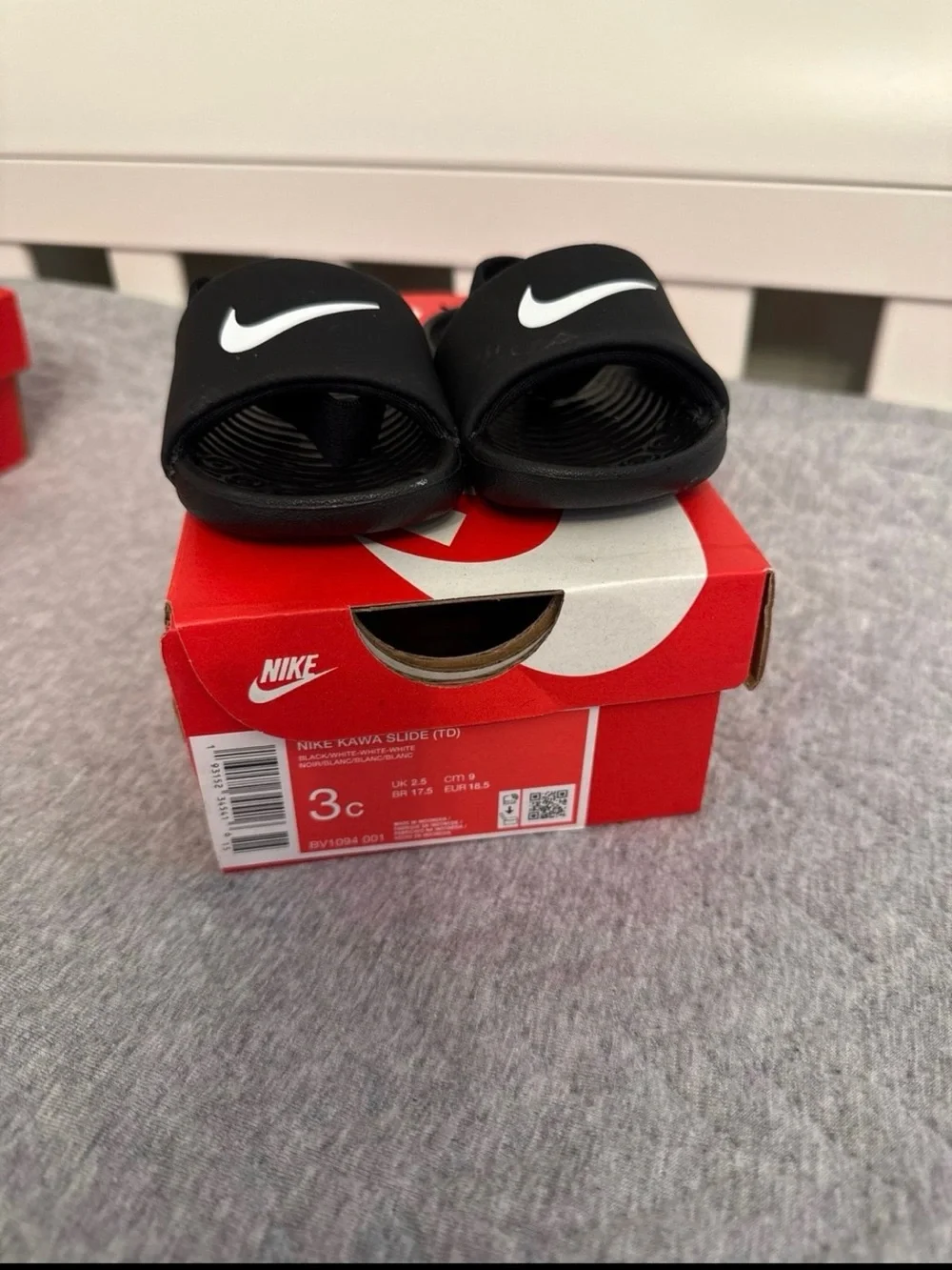 Nike Kids Black Slide Sandals with White Swoosh